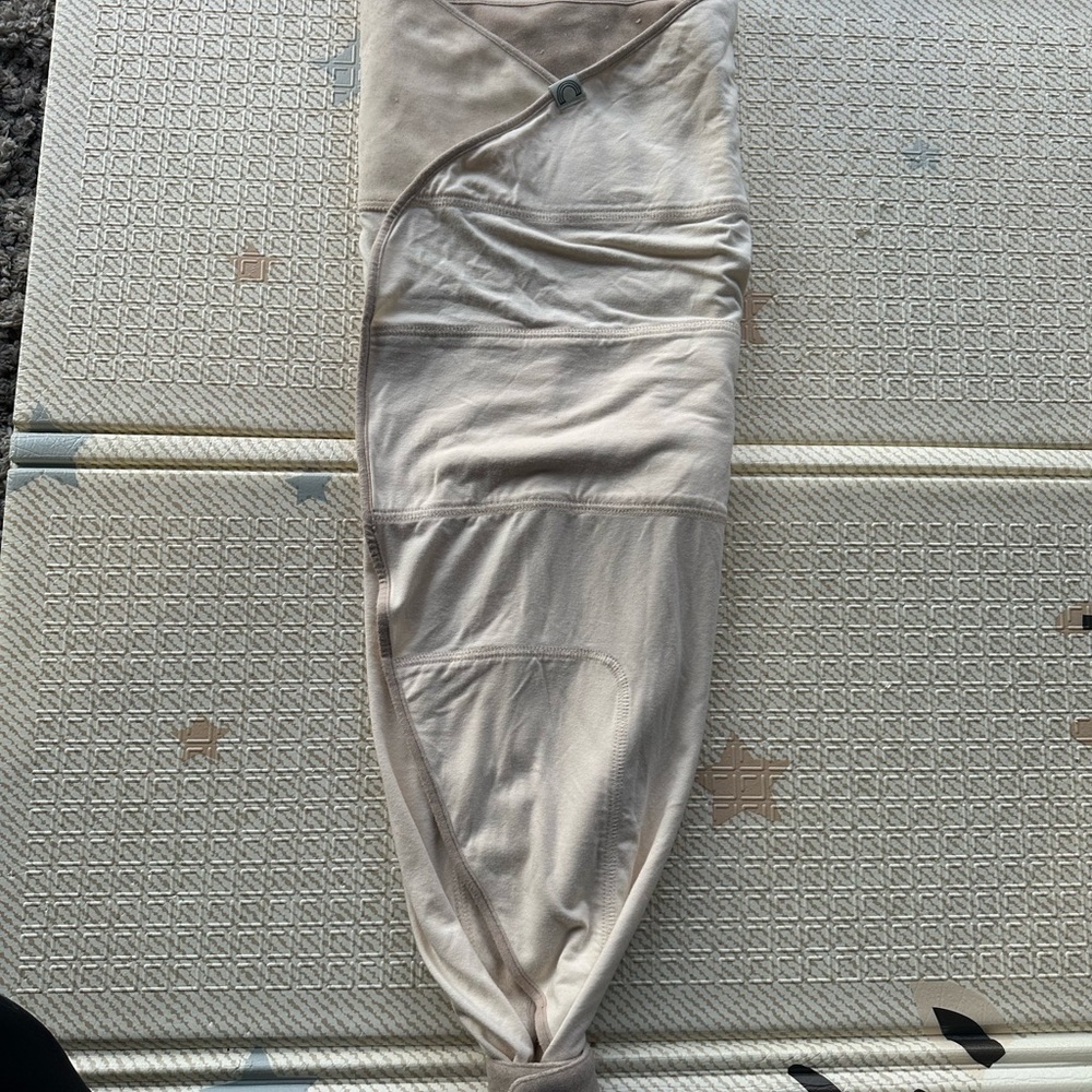 Taking Cara babies swaddle